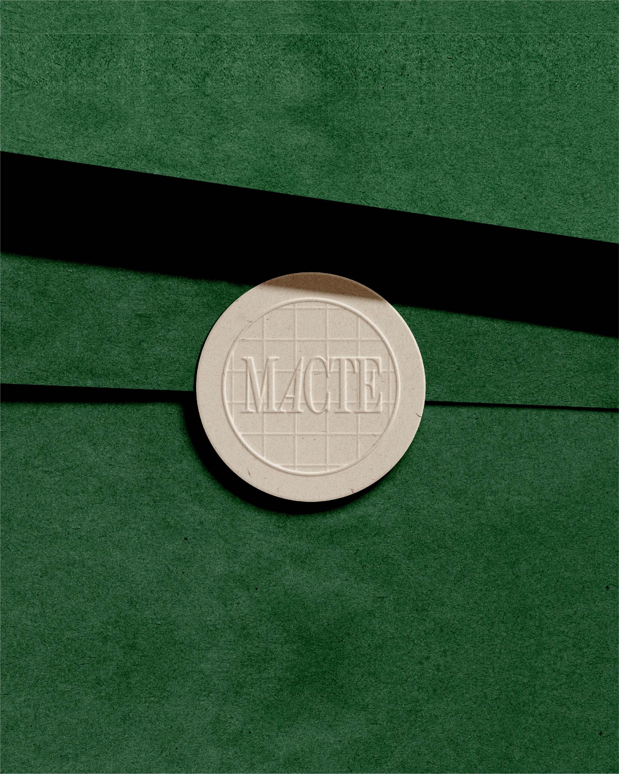 Embossed sticker with educational brand logo stamp on luxury stationery